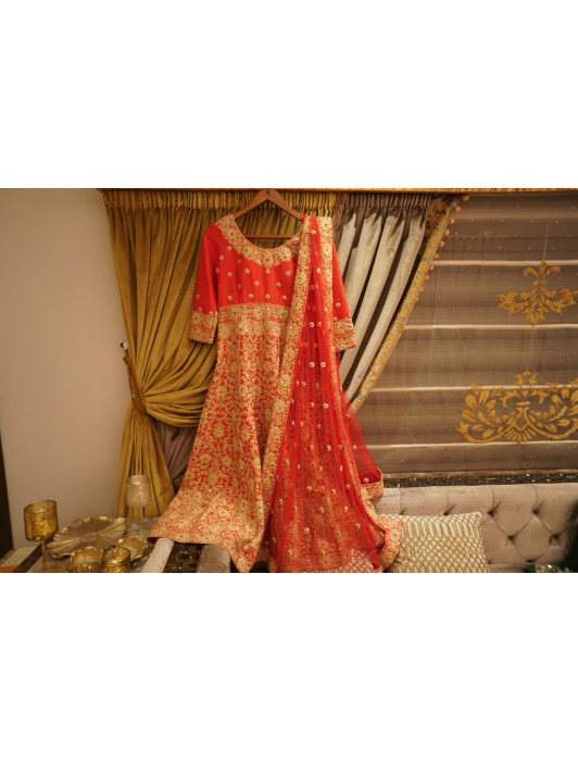 Red silk gown with beige embroidery jaal and sequins work