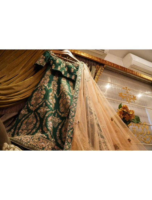 Forest green silk lehanga with sequins thread and zari embroidery