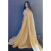 Golden  hand  embroidered  gown  with  a cape